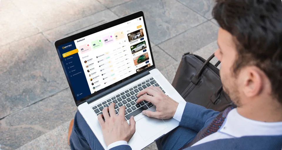 The RentedWheels car owner portal on a laptop